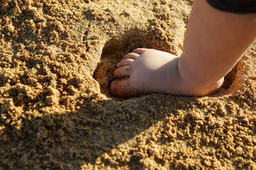 pied dans le sable 