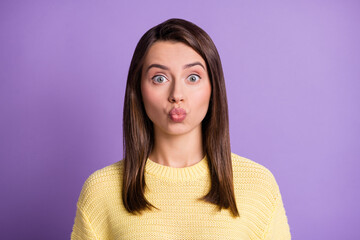 Fototapeta premium Photo portrait of nice cute female student sending air kiss with plump pouted lips isolated on bright color purple background