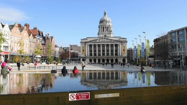 Nottingham, England – November 05, 2020: The imposing Nottingham Council House stands high above Nottingham's city centre acting as a backdrop to Nottingham's Old Market Square.
