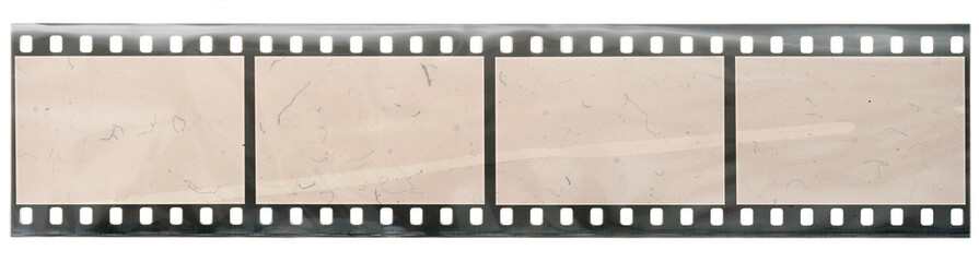 long 35mm dia positive filmstrip behind foil material isolated on white background with blank...