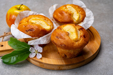 Fresh baked muffins with apple and cinnamon close up