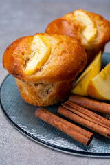 Fresh baked muffins with apple and cinnamon close up