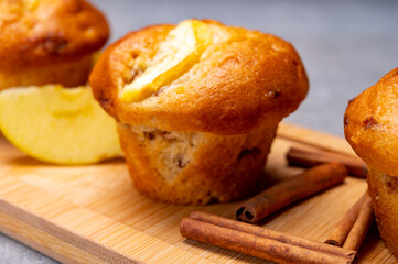 Fresh baked muffins with apple and cinnamon close up