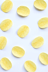 Potato chips on white background. Top view