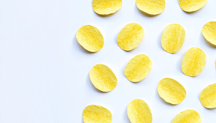 Potato chips on white background. Top view