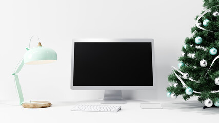 mockup computer monitor screen on working desk next to lamp and christmas tree, 3D illustration