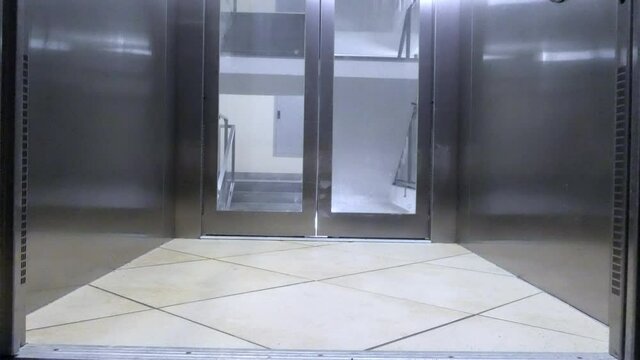 Elevator door - stock video. Opening and closing.