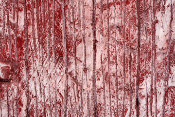 Texture of a concrete wall with cracks and scratches which can be used as a background