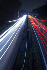 Highway at night with traffic blurred by motion in Arnhem, Netherlands