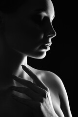 Beautiful Woman silhouette in the dark