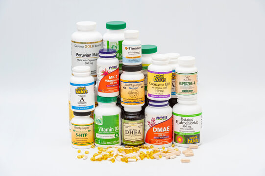 Fuji City, Shizuoka Prefecture, Japan - April 4, 2020: Colorful packages of different brands of nutritional supplements. Isolated on white background. Copy space. Close-up. Horizontal shot.
