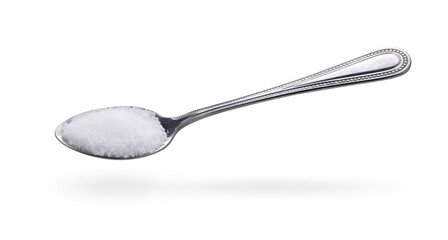 salt in stainless steel spoon on white background