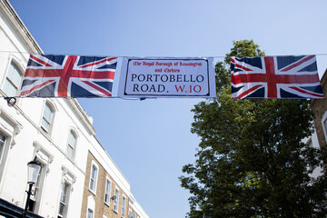 Fototapeta na wymiar Flag of United Kingdom and Portobello Road sign