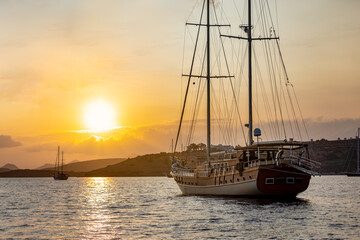 A gulet sailing boat during sunset at the Aegean sea near Bodrum in Turkey
