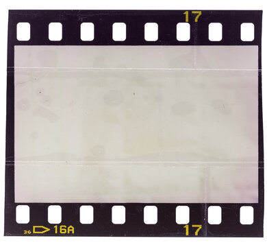 vintage retro blank photo placeholder, real macro photo of 35mm filmstrip with scratches and adhesive remain.