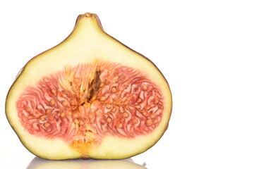 Ripe dark blue organic figs, close-up, on a white background.