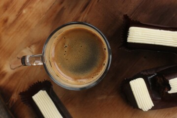 Americano coffee with chocolate brownies on the table