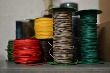 Multicolored sewing rope on spools