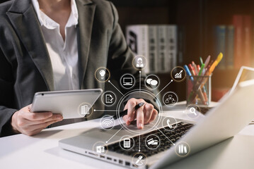Businessman documents on the desk with a notebook and business graph graph with office icons in the morning. 