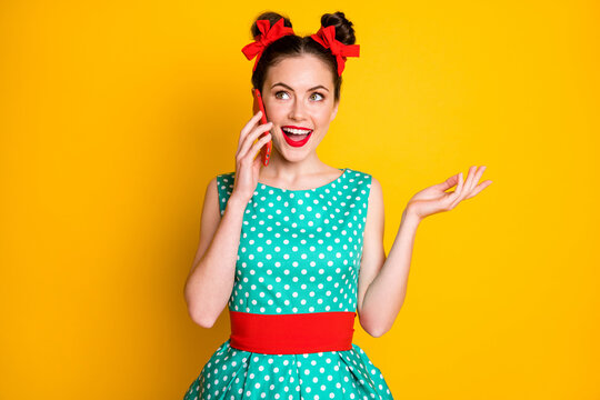 Portrait of excited girl use smartphone call friend tell news wear teal clothes isolated bright shine color background