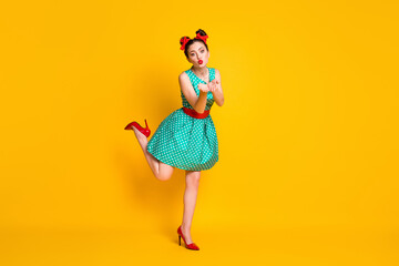 Full length photo of cute girl hold hand send air kiss wear green teal skirt stilettos legs...