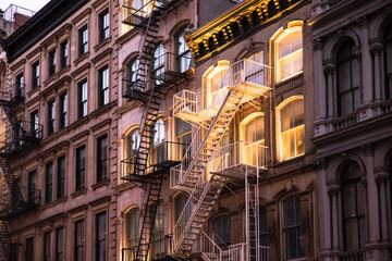 New York City apartment buildings in the evening with lights - 390409765