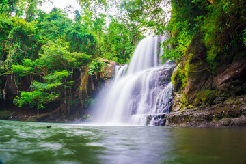 Fototapeta na wymiar Waterfall with rocky in tropical rain forest on Koh Kood island