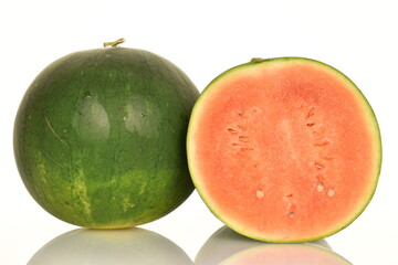 Ripe organic watermelons, close-up, on a white background.