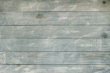 Vintage blue wood background texture with knots and nail holes. Old painted wood wall. Blue abstract background. Vintage wooden dark blue horizontal boards. Front view with copy space