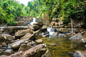 Fototapeta na wymiar Waterfall with rocky in tropical rain forest on Koh Kood island