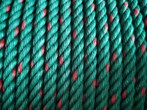 pattern of a green plastic rope in the stores.