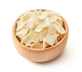 Parmesan flakes in a wooden bowl
