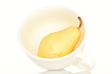 Ripe organic yellow-red pears, close-up, on a white background.