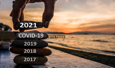 New Year 2021 is coming concept. Covid year 2020 to 2021 background. Positive turn of old year....