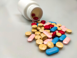 Colorful pills on the table