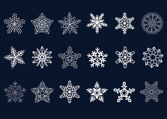 The isolated contours of decorative snowflakes on a dark background.