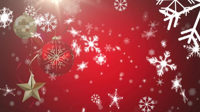 Digital animation of snowflakes falling over christmas star and bauble decorations hanging