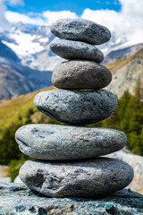Fototapeta na wymiar stacked stones in the mountains