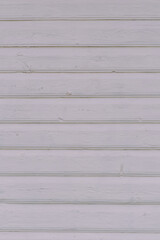 Vertical photography of real white wooden painted abstract background of wall of old rustic house