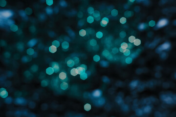Christmas blue bokeh, lights in winter night, Abstract new year background © Alya
