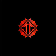 Initials logo TT mandala combination on a black background