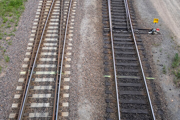 Fototapeta na wymiar railroad point: to one railway line is moving to two tracks