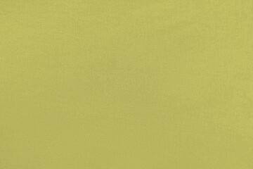 Yellow  green homogeneous background with a textured surface