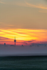 Obraz premium The Cologne television tower and skyline at sunrise