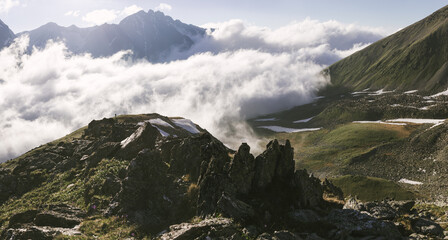 Beautiful picturesque view of tourist standing on edge of mountain with fascinating view