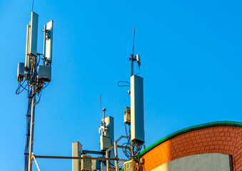 Cellular antennas on the roof of the house.