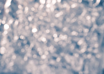 Winter abstract bokeh background, blurred christmas lights, snowfall texture, new year concept