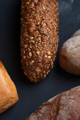 Flat lay bread background. Freshly baked assortment of bread.