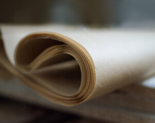 Roll of parchment paper close-up selective focus