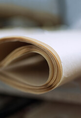 Roll of parchment paper close-up selective focus